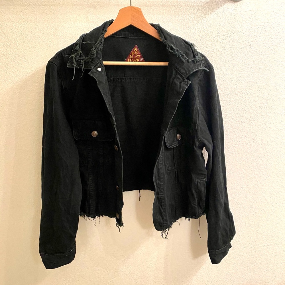Distressed black denim jacket